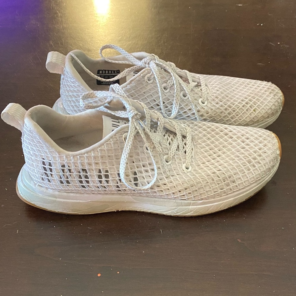 Womans Nobull, White Size 9. No insoles. In pretty good condition.